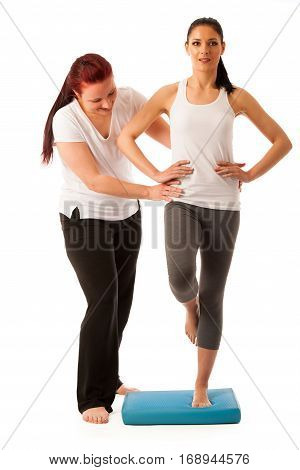 Physiotherapy - Therapist Doing   Excercises For Improving Coordination And Stability With A Patient