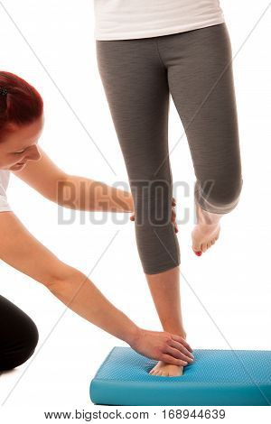 Physiotherapy - Therapist Doing   Excercises For Improving Coordination And Stability With A Patient
