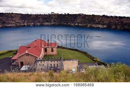 Blue Lake with the pumping station at Mt Gambier South Australia. The Blue Lake is a large monomictic crater lake located in a dormant volcanic maar associated with the Mount Gambier maar complex.