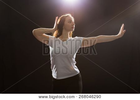 Hip-hop, Jazz-funk, Tecktonik, Waacking, Trance And Street Dances Concept - Young Woman Dancing Jazz
