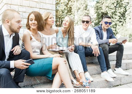 Meeting Of Young People, Team Of Businessmen In Nature. Lifestyle, Young Entrepreneurs