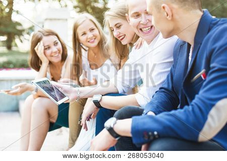 Meeting Of Young People, Team Of Businessmen In Nature. Lifestyle, Young Entrepreneurs