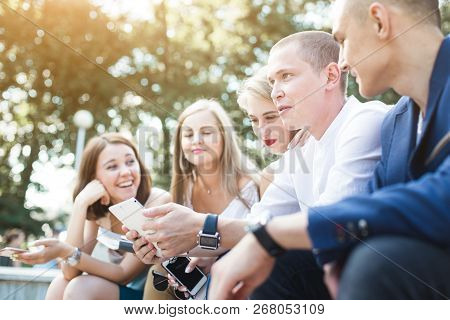 Meeting Of Young People, Team Of Businessmen In Nature. Lifestyle, Young Entrepreneurs