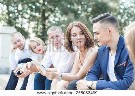 Meeting Of Young People, Team Of Businessmen In Nature. Lifestyle, Young Entrepreneurs