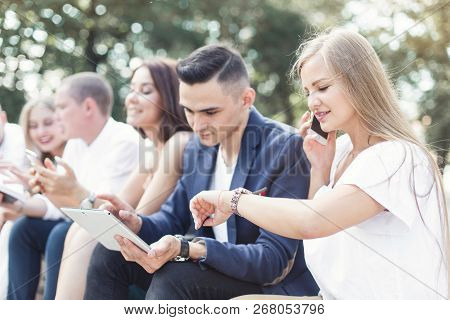 Meeting Of Young People, Team Of Businessmen In Nature. Lifestyle, Young Entrepreneurs
