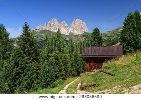 Summer Landscape Of Fassa Valley With Sassolungo Mount On Background