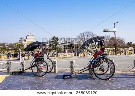 Rickshaw Waiting For Tourist Service Around Himeji Castle On Day Blue Sky Bright Hyogo Prefecture. J