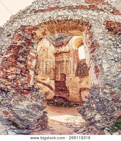 Ruins Of The Castle Gymes In Slovak Republic. Travel Destination. Detailed Scene. Red Photo Filter.