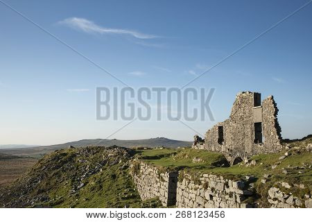 Beautiful Landscape Sunset Image Over Abandoned Foggintor Quarry In Dartmoor With Raking Soft Sunlig