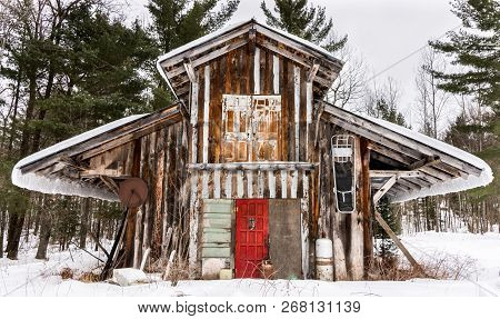 Sawmill Winter Angel Builing Covered In Snow Bright Coloerd Doors