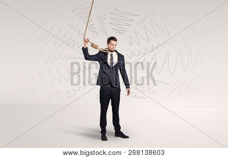 Hopeless young businessman trying to suicide with question signs concept