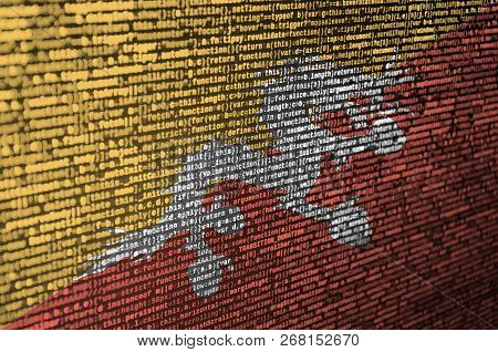 Bhutan Flag  Is Depicted On The Screen With The Program Code. The Concept Of Modern Technology And S