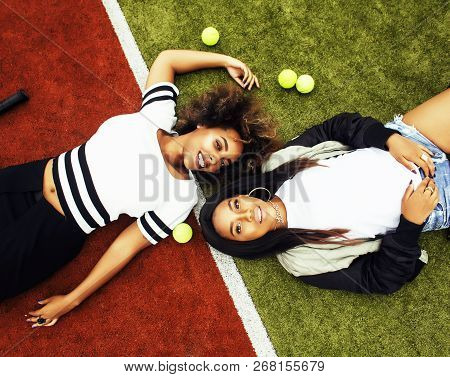 Young Pretty Girlfriends Hanging On Tennis Court, Fashion Stylis