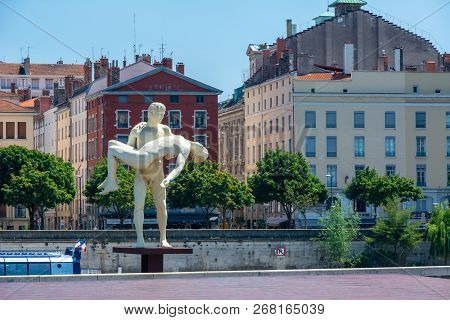 Lyon, France - July 19, 2018: The Statue The Weight Of One Self Made By Michael Elmgreen And Ingar D