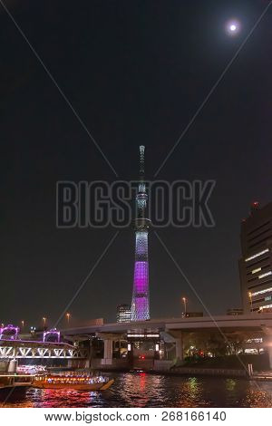 Tokyo, Japan - March 29, 2018: Tokyo Skytree Tower with cherry blossoms in full bloom at Sumida Park
