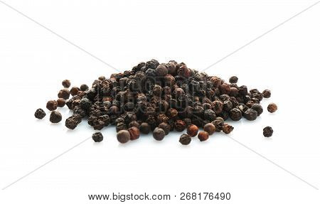 Black Pepper Grains On White Background. Natural Spice