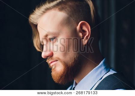 Portrait Of Blonde Young Man With Uncommon Appearance Wears White T Shirt.