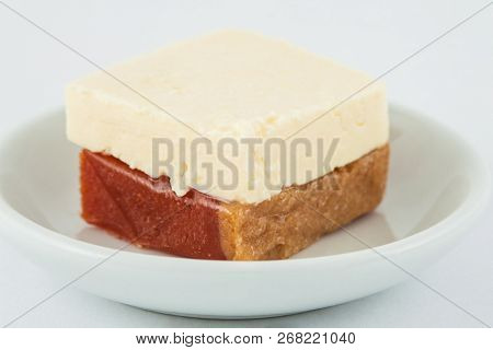 Traditional Colombian Sweet From The Velez Town In Santander Called Bocadillo Served With White Chee