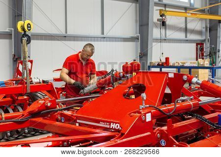 Roshchinsky, Russia - June 21, 2018: Plant For The Production Of Agricultural Machinery. Workers Mak