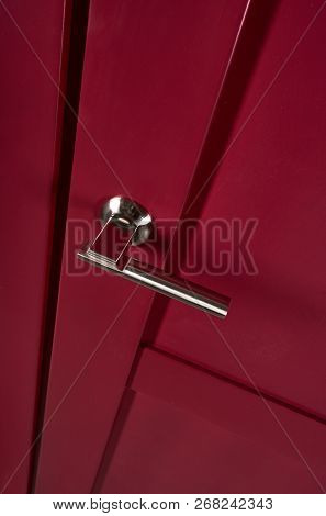 Closeup Photo Of Dark Cherry Wooden Door With Metal Handle
