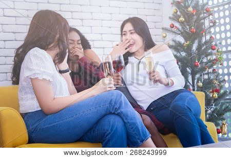 Closeup Photo Of Cheerful Girls Celebrating A Party At Home With Campaign.