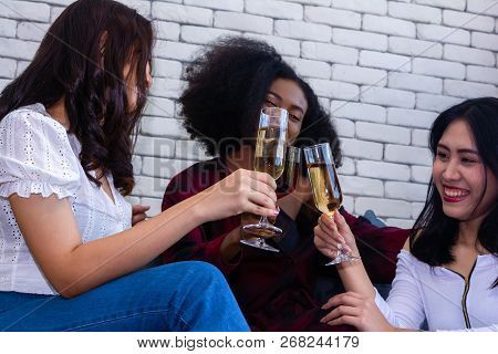 Closeup Photo Of Cheerful Girls Celebrating A Party At Home With Campaign.