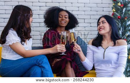 Closeup Photo Of Cheerful Girls Celebrating A Party At Home With Campaign.