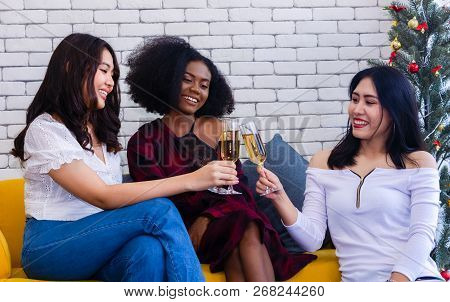 Closeup Photo Of Cheerful Girls Celebrating A Party At Home With Campaign.