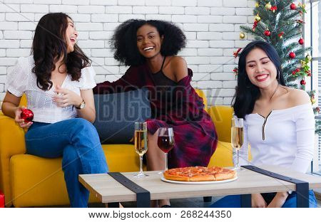 Closeup Photo Of Cheerful Girls Celebrating A Party At Home With Campaign And Pizza.
