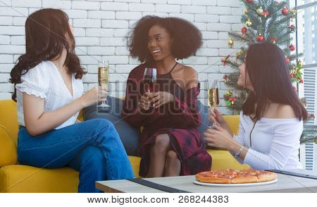 Closeup Photo Of Cheerful Girls Celebrating A Party At Home With Campaign And Pizza.