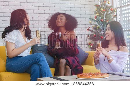Closeup Photo Of Cheerful Girls Celebrating A Party At Home With Campaign And Pizza.