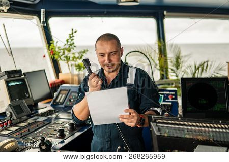 Marine Navigational Officer Is Reporting By Vhf Radio