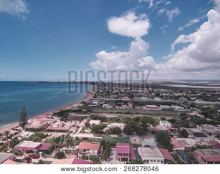 Aerial view of Granelli beach, a seaside place in Sicily. The shot is taken in a beautiful sunny sum
