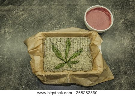 Cooking Of Marijuana Poppy Seed Cake With Chocolate And Pink Fruit Glaze