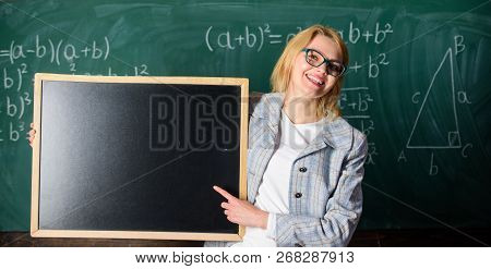 Hometask Information. Teacher Show School Information. Teacher Smart Smiling Woman Hold Blackboard B