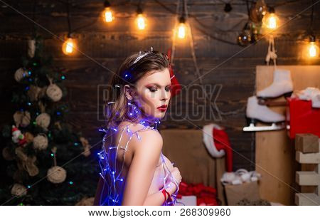 Happy Girl Preparing To Celebrate New Year And Merry Christmas. Xmas Fashion