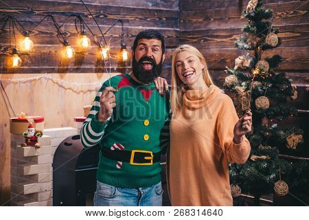 Happy Family Preparing To New Year. Christmas Holiday Home Party. Bengal Lights. The Festive Bright.