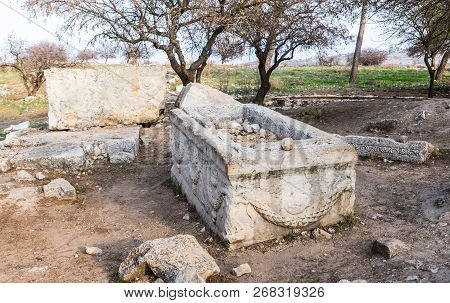 The Remains Of The Sarcophagus On The Ruins Of The Destroyed Roman Temple, Located In The Fortified 