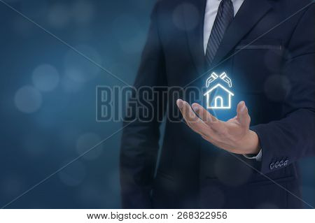 Insurance Concept, Business Man Hand Holding The Protection Home,construction Icon , Meaning Man, Co