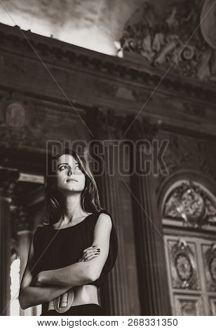 Style Girl In Dress In Versailles Palace Glass Room. Image In Black And White Color Style