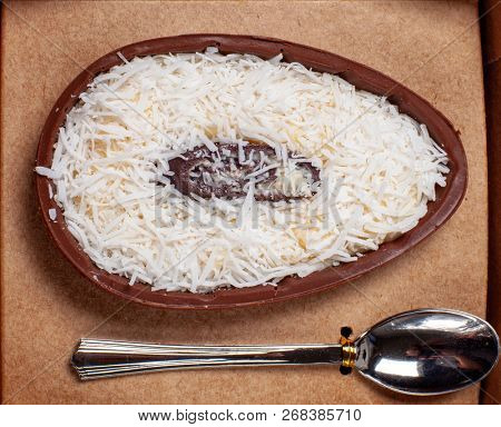Easter egg eating with spoon