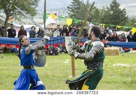 Tlaxcala, Mexico- September 29, 2018: Two Knights Fighting With Swords During Medieval Festival In T