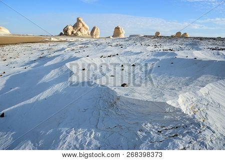 Beautiful Landscape In Western White Desert At Sunset, Sahara. Egypt. Focus On Foreground