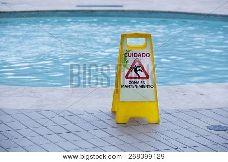 Preventive Warning - Danger. Slippery Floor In The Area Of ​​a Pool