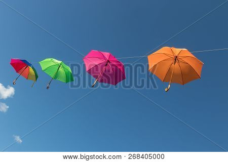 Multi Color Umbrellas Floating In Werfenweng, Austria