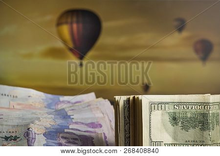 Savings Destined To Navigate Through Cappadocia. Colorful Hot Air Balloons Flying In The Clear Morni