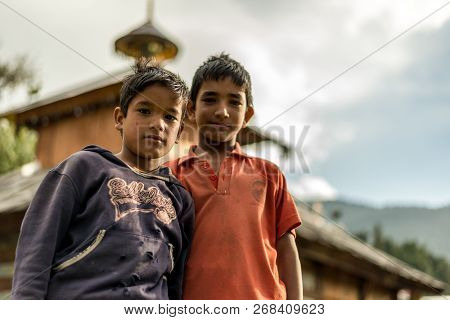 Sankri Range, Uttarakhand, India - October 7, 2018 : Portrait Of Two Young Boy In Himalayas -