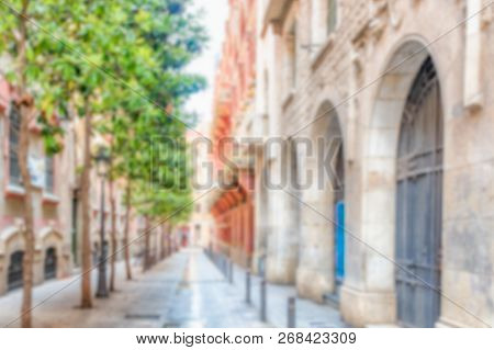 Defocused Background Of A Scenic Street In La Ribera District Of Barcelona, Catalonia, Spain. Intent