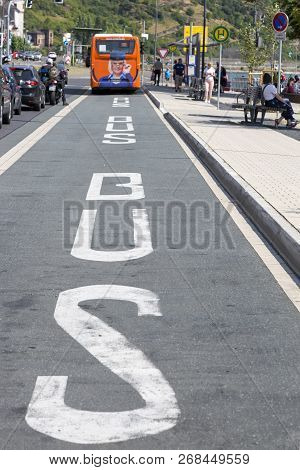 Sankt Goarshausen, Germany - July 07, 2018: A Dedicated Lane For Bus Traffic On The Main Street Of T