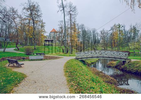 Old Casttle Park At Autumn. Yellow Leafs, Castle And Architecture. Travel Photo 2018.